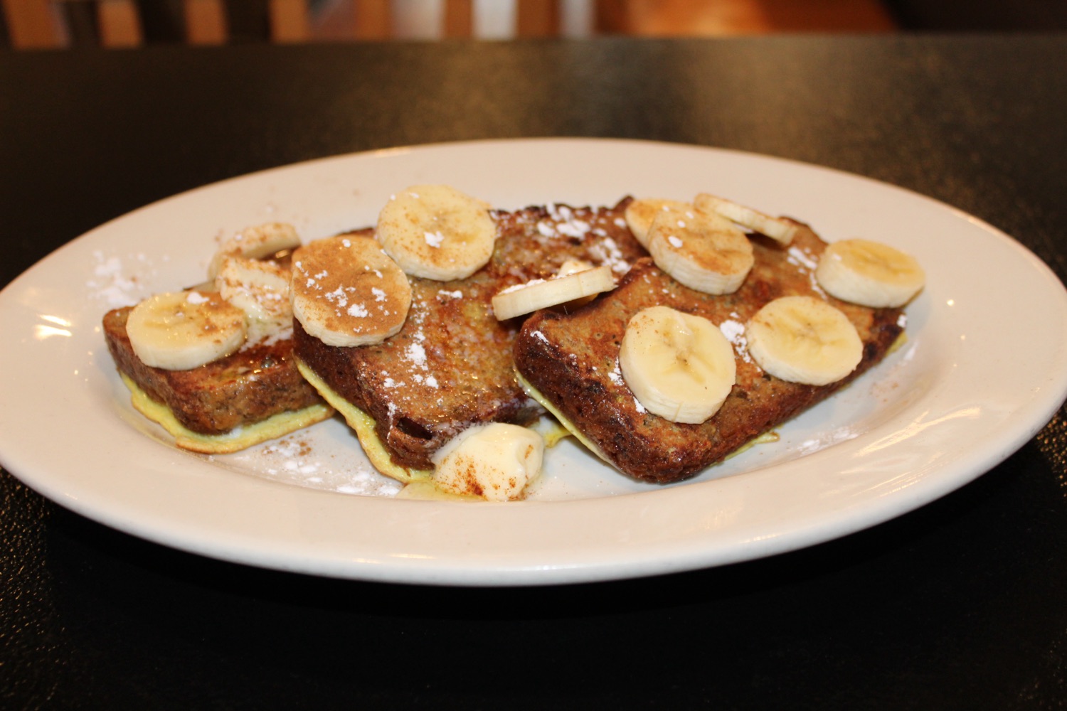Banana French toast dusted with cinnamon sugar