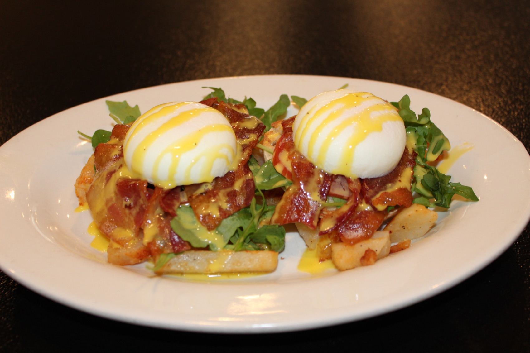 A fresh Eggs Benedict breakfast plate served at Jack's Cafe in Verona, NJ