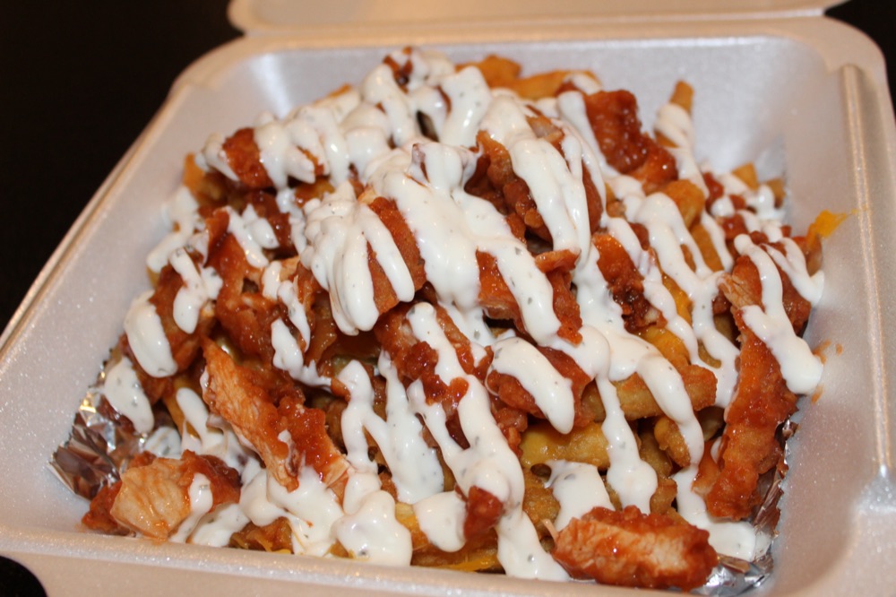 Loaded fries with drizzle